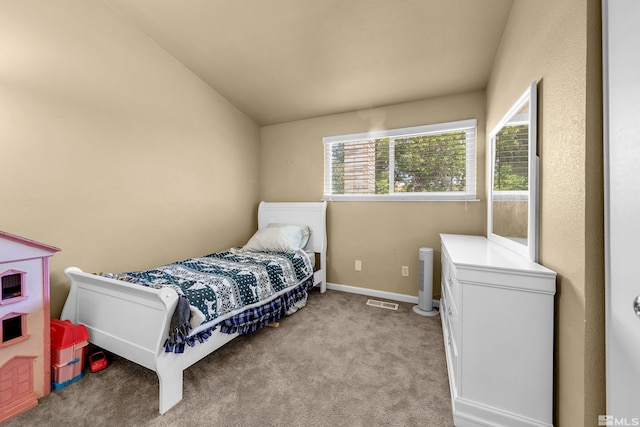 1874 Rosemary Dr, Sparks, NV 89434 - bedroom with light colored carpet, lofted ceiling, and baseboards