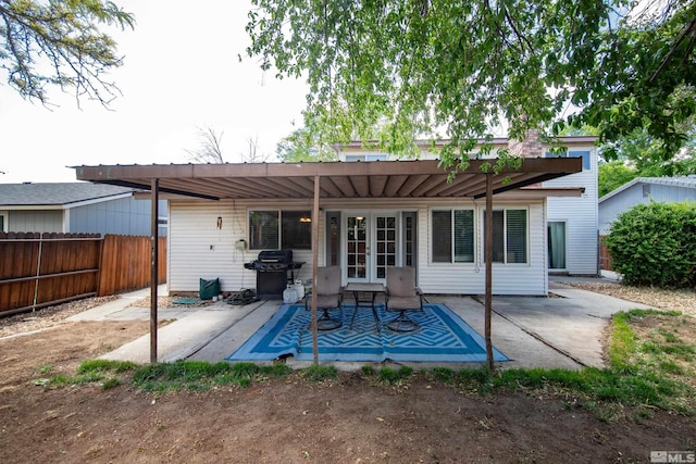 1874 Rosemary Dr, Sparks, NV 89434 - rear view of house featuring french doors, a patio, and fence