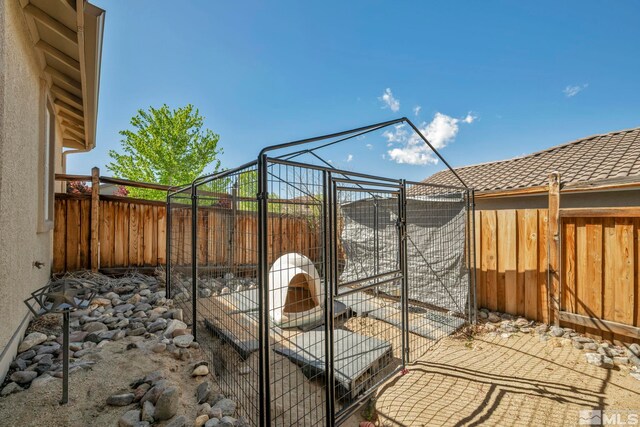 4184 Passage Dr, Sparks, NV 89436 - view of patio with a fenced backyard and an outbuilding