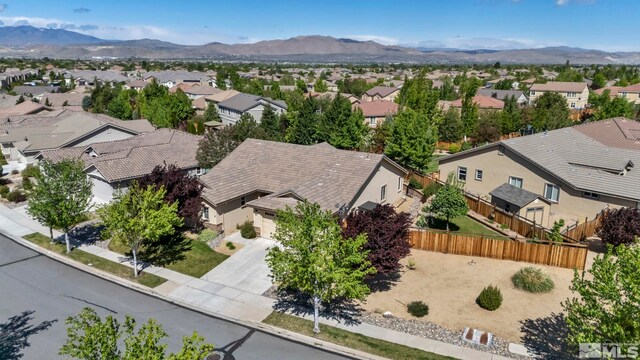 4184 Passage Dr, Sparks, NV 89436 - aerial view of residential area with a mountainous background