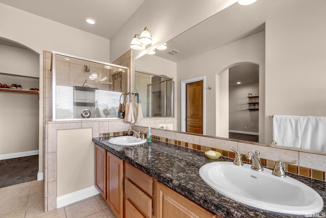 785 Sarcinella Ct, Reno, NV 89509 - bathroom featuring a shower stall, tile patterned floors, double vanity, and baseboards