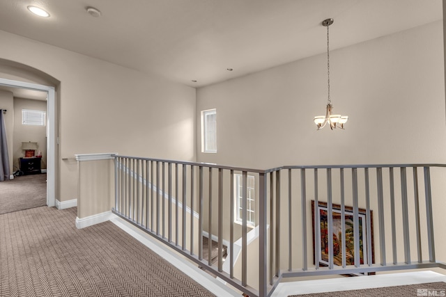 785 Sarcinella Ct, Reno, NV 89509 - hallway featuring carpet floors, a chandelier, baseboards, plenty of natural light, and recessed lighting