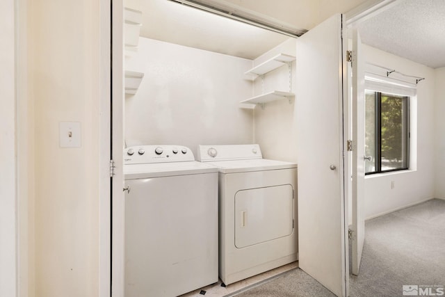 4545 Reggie Rd, Reno, NV 89502 - laundry area with washer and clothes dryer and light colored carpet