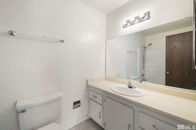4545 Reggie Rd, Reno, NV 89502 - bathroom featuring toilet, vanity, bathtub / shower combination, and baseboards