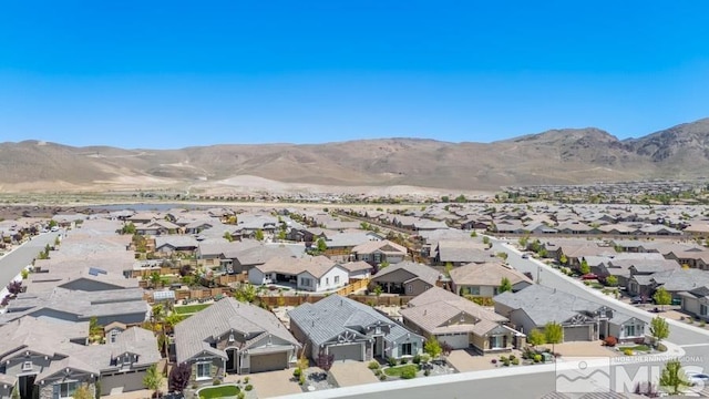9680 Thesolious Ln, Reno, NV 89521 - aerial perspective of suburban area featuring a mountain backdrop