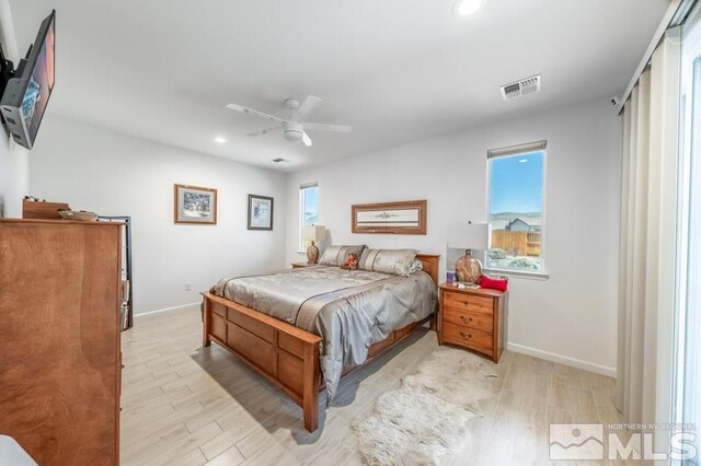 9680 Thesolious Ln, Reno, NV 89521 - bedroom featuring light wood-type flooring, baseboards, recessed lighting, and a ceiling fan
