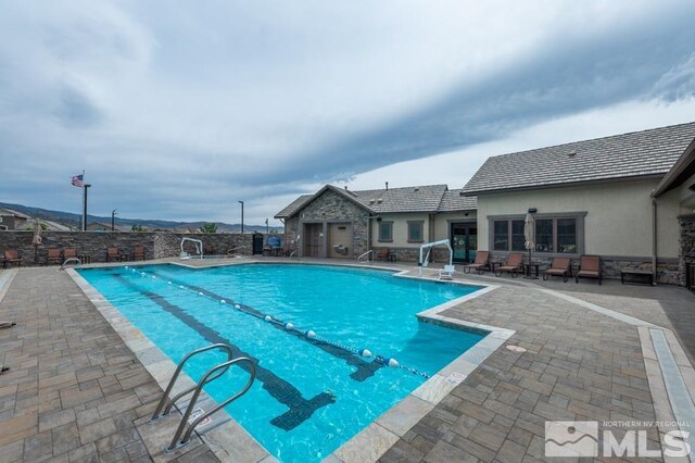 9680 Thesolious Ln, Reno, NV 89521 - view of swimming pool with a patio