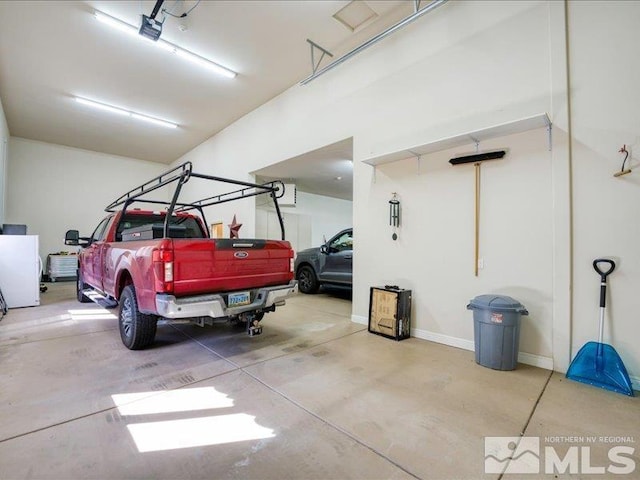 garage featuring baseboards