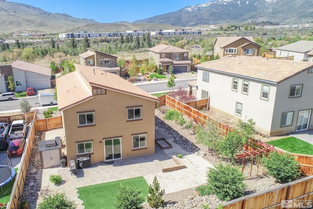8139 Dornoch Dr, Reno, NV 89439 - aerial perspective of suburban area with a mountainous background