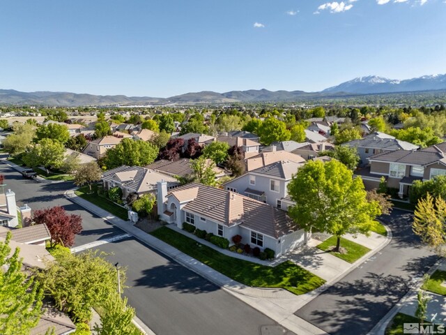 aerial perspective of suburban area with mountains