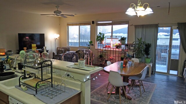 201 Crown Point Dr, Dayton, NV 89403 - dining area featuring ceiling fan, wood finished floors, and a chandelier