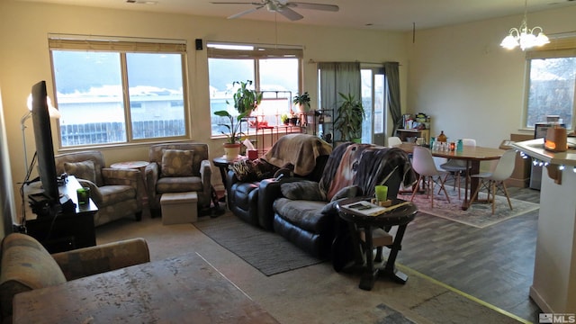 201 Crown Point Dr, Dayton, NV 89403 - living area featuring a ceiling fan, healthy amount of natural light, and a chandelier