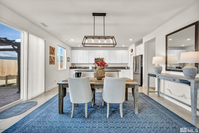 103 Pilot Peak, Carson City, NV 89701 - dining room featuring light tile patterned floors, recessed lighting, and baseboards