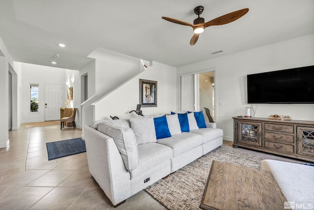 103 Pilot Peak, Carson City, NV 89701 - living room with a ceiling fan, light tile patterned floors, stairway, baseboards, and recessed lighting