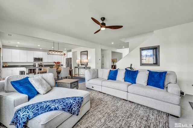 103 Pilot Peak, Carson City, NV 89701 - living room featuring a ceiling fan, recessed lighting, baseboards, and light tile patterned floors