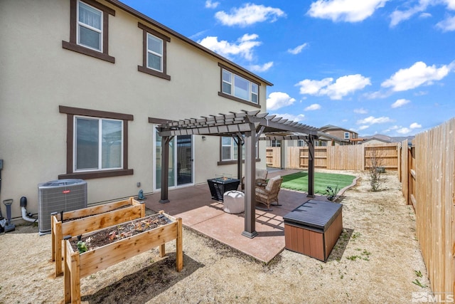 103 Pilot Peak, Carson City, NV 89701 - rear view of property featuring central air condition unit, stucco siding, a fenced backyard, a patio, and a pergola