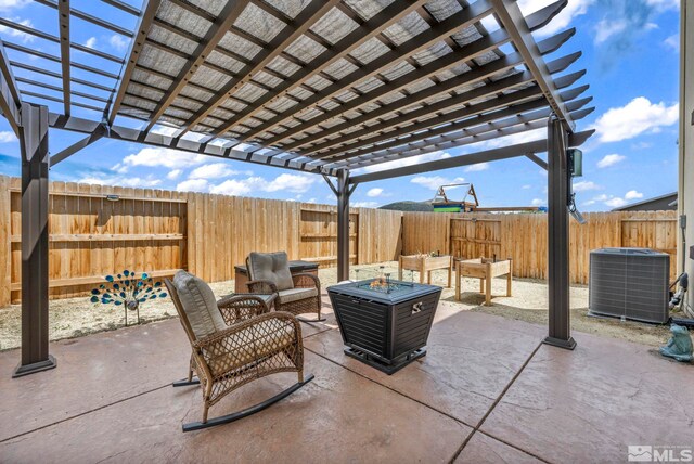 103 Pilot Peak, Carson City, NV 89701 - view of patio featuring cooling unit, a pergola, a fenced backyard, and an outdoor living space with a fire pit