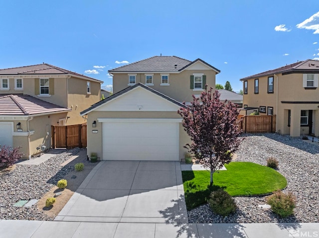 3097 Livorno Dr, Sparks, NV 89434 - traditional home featuring fence, driveway, an attached garage, and stucco siding