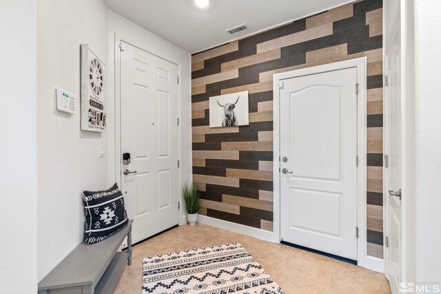 3097 Livorno Dr, Sparks, NV 89434 - tiled entrance foyer featuring wooden walls