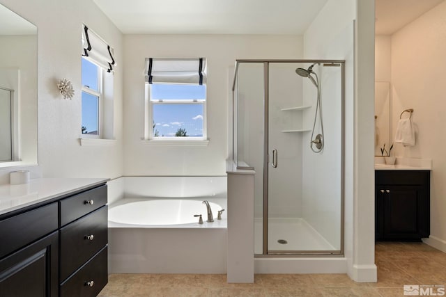 3097 Livorno Dr, Sparks, NV 89434 - full bathroom with vanity, a stall shower, a bath, and tile patterned flooring
