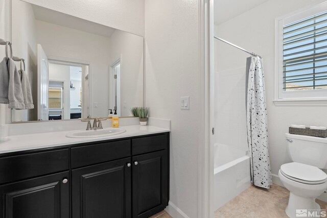 3097 Livorno Dr, Sparks, NV 89434 - bathroom featuring toilet, vanity, tile patterned floors, shower / tub combo with curtain, and baseboards