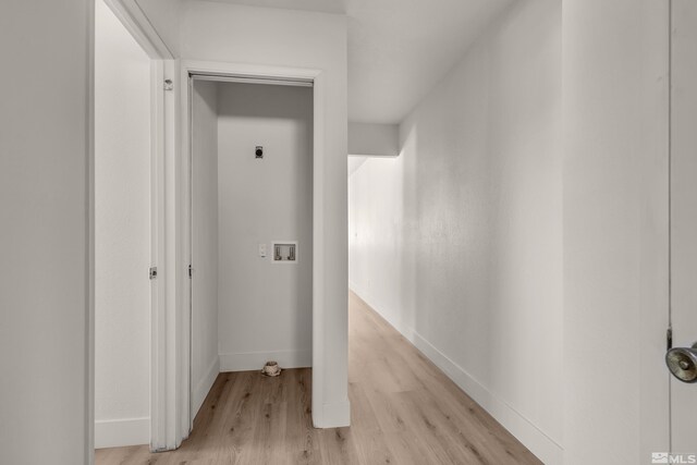 745 Jamaica Ave Unit 4, Reno, NV 89502 - washroom with hookup for an electric dryer, light wood-type flooring, and baseboards