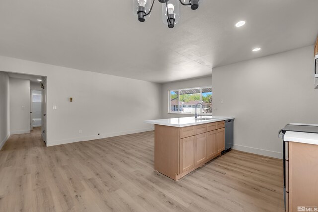 745 Jamaica Ave Unit 4, Reno, NV 89502 - kitchen with dishwashing machine, a peninsula, a sink, light wood finished floors, and recessed lighting