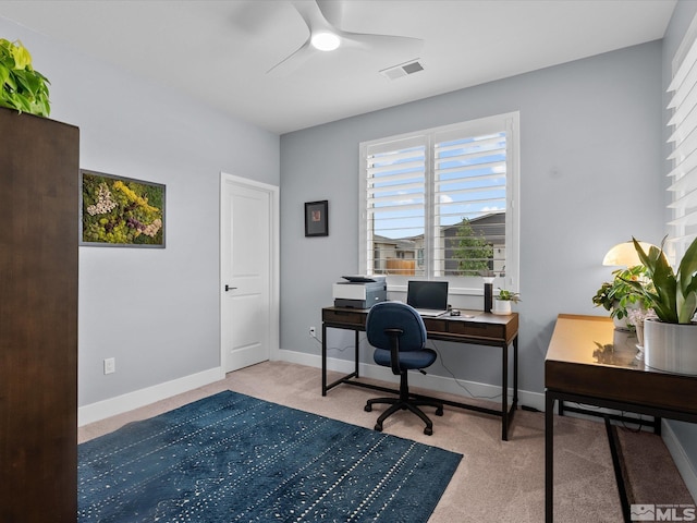 home office featuring ceiling fan, carpet flooring, and baseboards