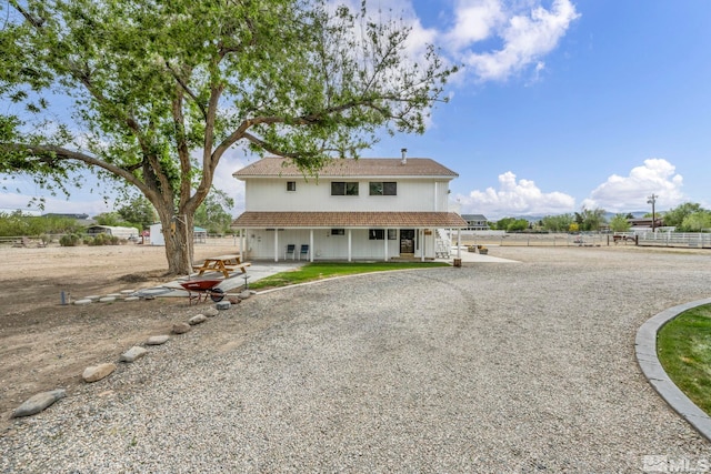 1131 Linda Anne Ct, Gardnerville, NV 89410 - back of property featuring fence and a patio area