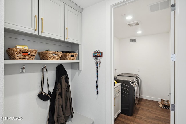 5410 Cactus Quartz Ct, Sparks, NV 89436 - laundry area featuring washing machine and dryer, cabinet space, dark wood finished floors, baseboards, and recessed lighting