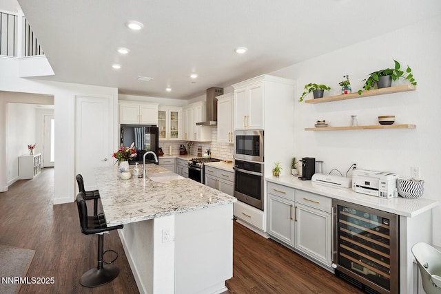 5410 Cactus Quartz Ct, Sparks, NV 89436 - kitchen featuring wine cooler, stainless steel appliances, a sink, a breakfast bar area, and decorative backsplash