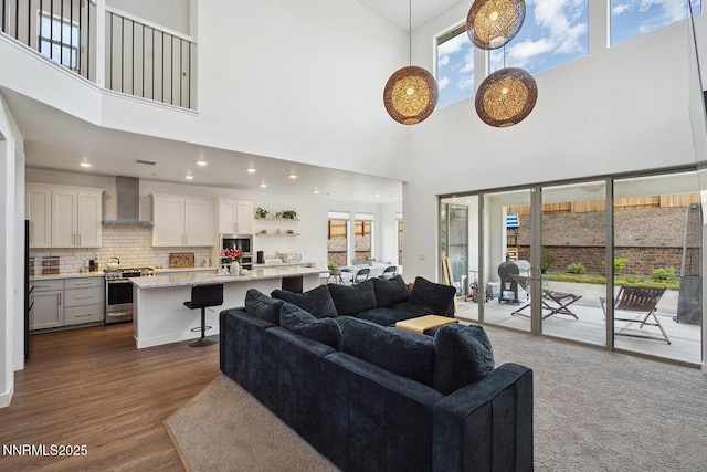 5410 Cactus Quartz Ct, Sparks, NV 89436 - living area featuring a towering ceiling and dark wood-style floors