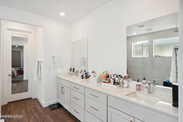 5410 Cactus Quartz Ct, Sparks, NV 89436 - ensuite bathroom featuring double vanity, wood finished floors, and a tile shower