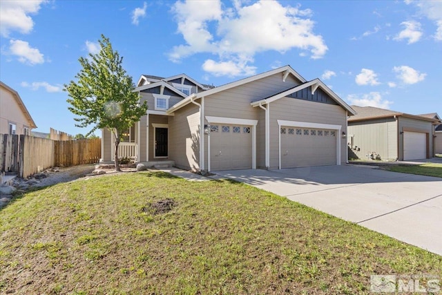 8952 Mahon Dr, Reno, NV 89506 - view of front of property featuring an attached garage, driveway, and board and batten siding