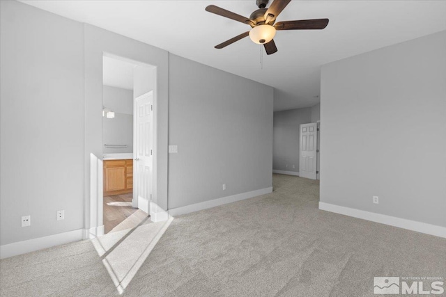 8952 Mahon Dr, Reno, NV 89506 - empty room with ceiling fan, light colored carpet, and baseboards