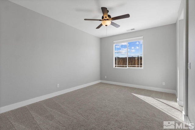 8952 Mahon Dr, Reno, NV 89506 - carpeted spare room featuring ceiling fan and baseboards