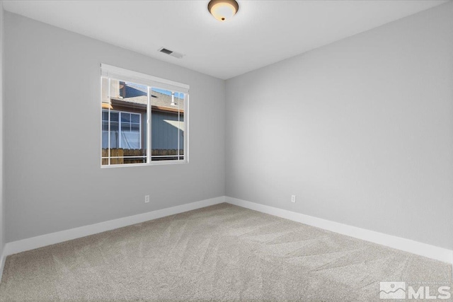 8952 Mahon Dr, Reno, NV 89506 - spare room featuring carpet and baseboards