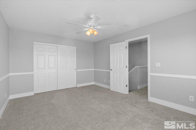 8952 Mahon Dr, Reno, NV 89506 - unfurnished bedroom with a closet, carpet flooring, and baseboards