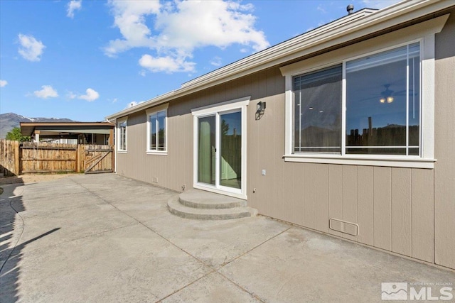 8952 Mahon Dr, Reno, NV 89506 - view of patio / terrace with fence and a gate