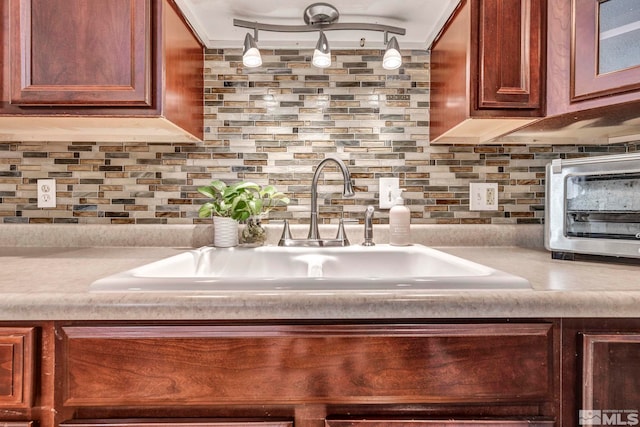 20 E Devere Way, Sparks, NV 89431 - kitchen view of a sink, tasteful backsplash, and light countertops
