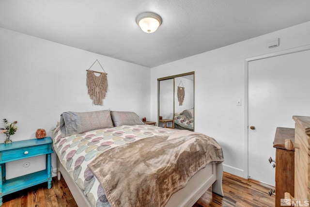 20 E Devere Way, Sparks, NV 89431 - bedroom featuring wood finished floors, a closet, and baseboards