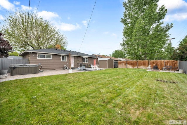 20 E Devere Way, Sparks, NV 89431 - back of house with a hot tub, a patio, a shed, and an outdoor structure