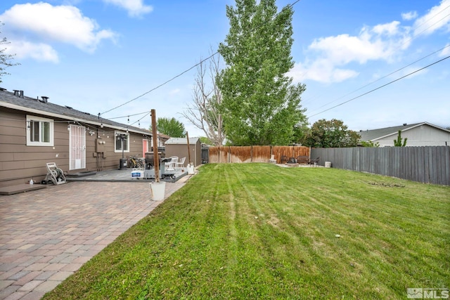 20 E Devere Way, Sparks, NV 89431 - view of yard with a patio area, an outbuilding, and a storage unit