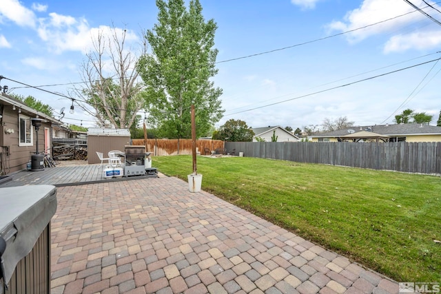 20 E Devere Way, Sparks, NV 89431 - view of patio with a wooden deck, a storage unit, and an outbuilding