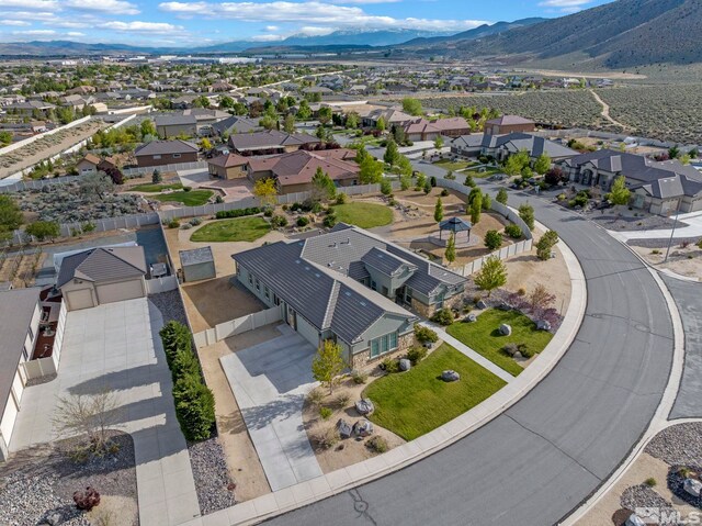 aerial view of residential area with a mountainous background