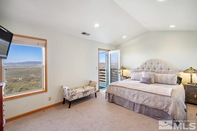 bedroom with carpet floors, multiple windows, access to outside, vaulted ceiling, and baseboards
