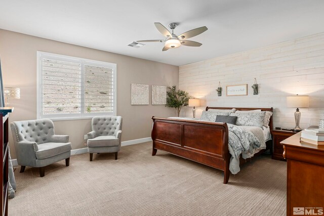 3325 Show Jumper Ln, Reno, NV 89521 - bedroom with baseboards, light colored carpet, a ceiling fan, and wooden walls