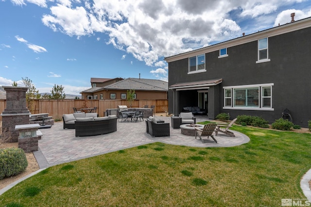 3325 Show Jumper Ln, Reno, NV 89521 - view of patio featuring an outdoor living space with a fire pit