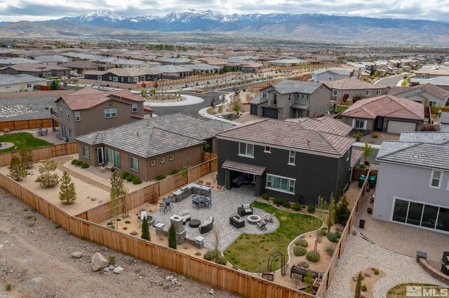 3325 Show Jumper Ln, Reno, NV 89521 - aerial perspective of suburban area with a mountainous background