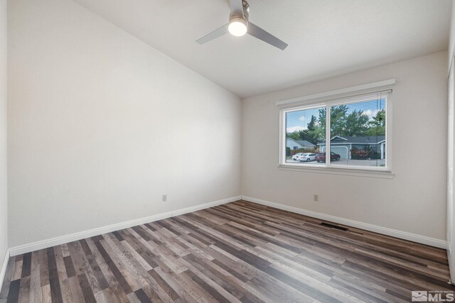 123 River Village Cir, Dayton, NV 89403 - spare room featuring vaulted ceiling, wood finished floors, baseboards, and a ceiling fan